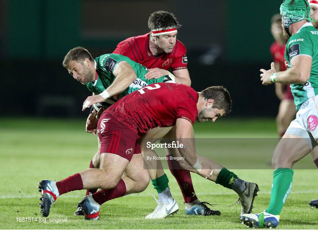 12 April 2019; Marco Zanon of Benetton is tackled by Billy Holland left and Rhys Marshall right during the Guinness PRO14 Round 20 game between Benetton and Munster Rugby at Stadio di Monigo in Treviso, Italy. Photo by Roberto Bregani/Sportsfile