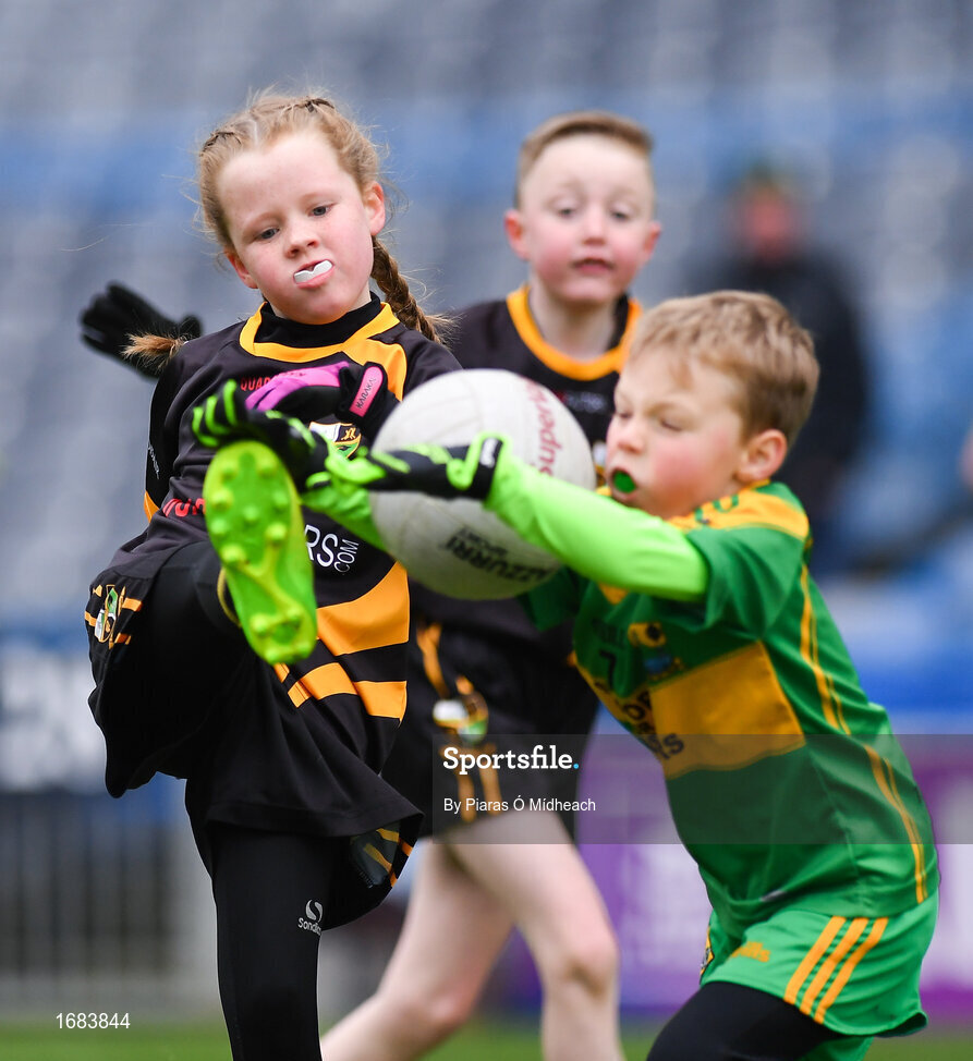 14 April 2019; Emma Condra of Nobber, Co Meath, in action against Daniel Connaughton of Tubberclair, Co Westmeath, during the Littlewoods Ireland Go Games Provincial Days in Croke Park. This year over 6,000 boys and girls aged between six and twelve represented their clubs in a series of mini blitzes and just like their heroes got to play in Croke Park. Photo by Piaras Ó Mídheach/Sportsfile