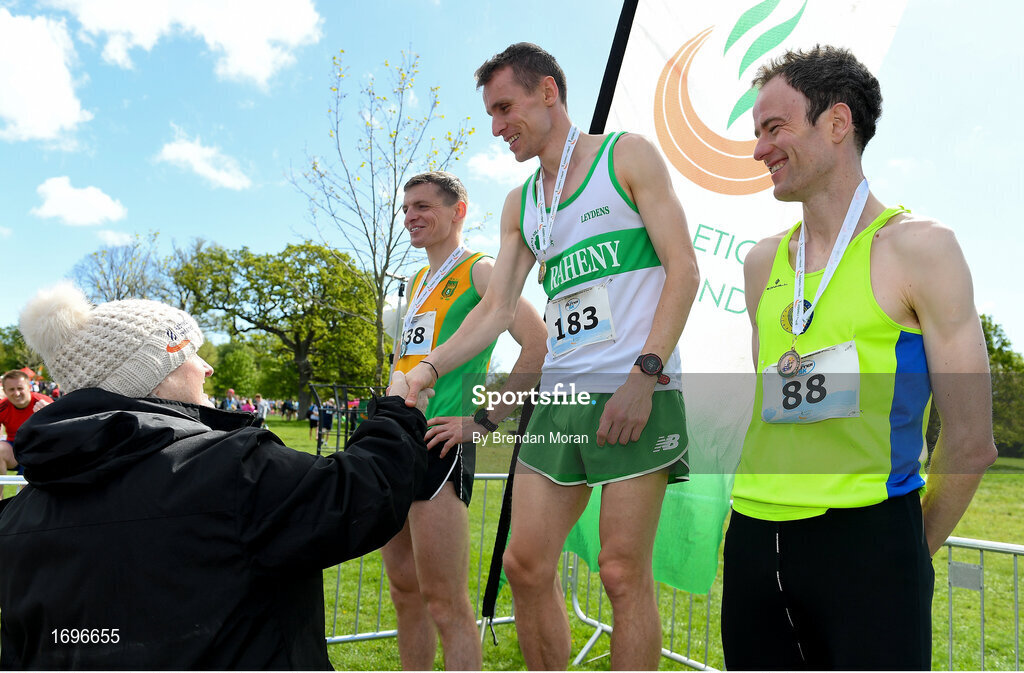 4 May 2019; Athletics Ireland President Georgina Drumm presents Kieran Kelly of Raheny Shamrock A.C in Dublin, with his medal after the AAI Men's National 5k Championship at the Irish Runner 5k in conjunction with the AAI National 5k Championships, Phoenix Park in Dublin. Photo by Brendan Moran/Sportsfile