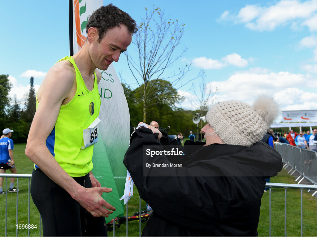 4 May 2019; Athletics Ireland President Georgina Drumm presents Peter Arthur of Liffey Valley A.C. in Dublin, with his medal after the AAI Men's National 5k Championship at the Irish Runner 5k in conjunction with the AAI National 5k Championships, Phoenix Park in Dublin. Photo by Brendan Moran/Sportsfile