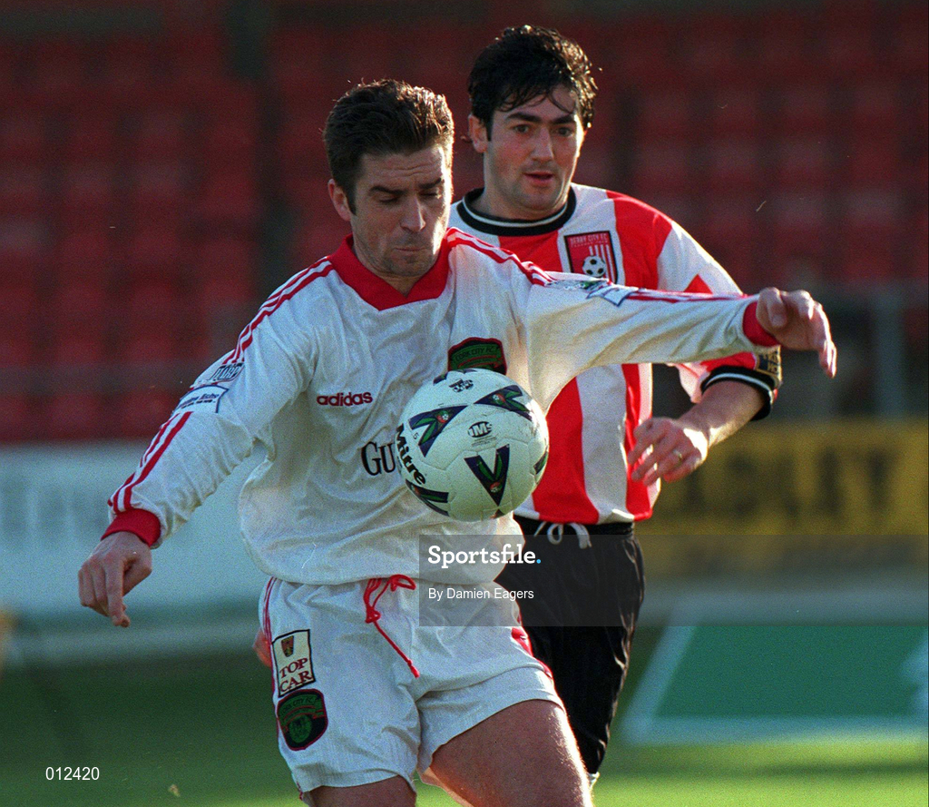 29 November 1998; Gerard Dobbs of Cork City in action against Peter Hutton of Derry City during the Harp Lager National League Premier Division match between Derry City and Cork City at the Brandywell Stadium in Derry. Photo by Damien Eagers/Sportsfile