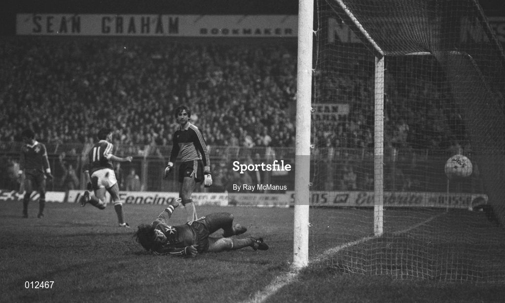 16 November 1983; Malta goalkeeper John Bonello fails to stop a goal, from a penalty, by Frank Stapleton, not pictured, during the UEFA EURO 1984 Qualifier Group 8 match between Republic of Ireland and Malta at Dalymount Park in Dublin. Photo by Ray McManus/Sportsfile