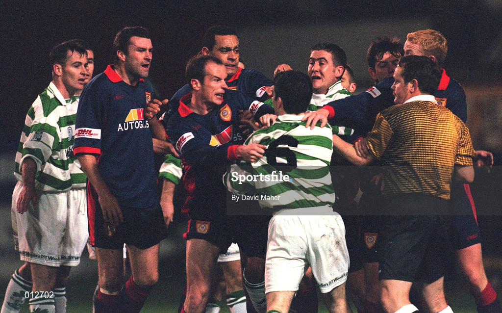 30 October 1998; Packie Lynch of St Patrick's Athletic tussles with Jason Colwell of Shamrock Rovers after being shown a red card by referee John McDermott during the Harp Lager National League Premier Division match between Shamrock Rovers and St Patrick's Athletic at Tolka Park in Dublin. Photo by David Maher/Sportsfile
