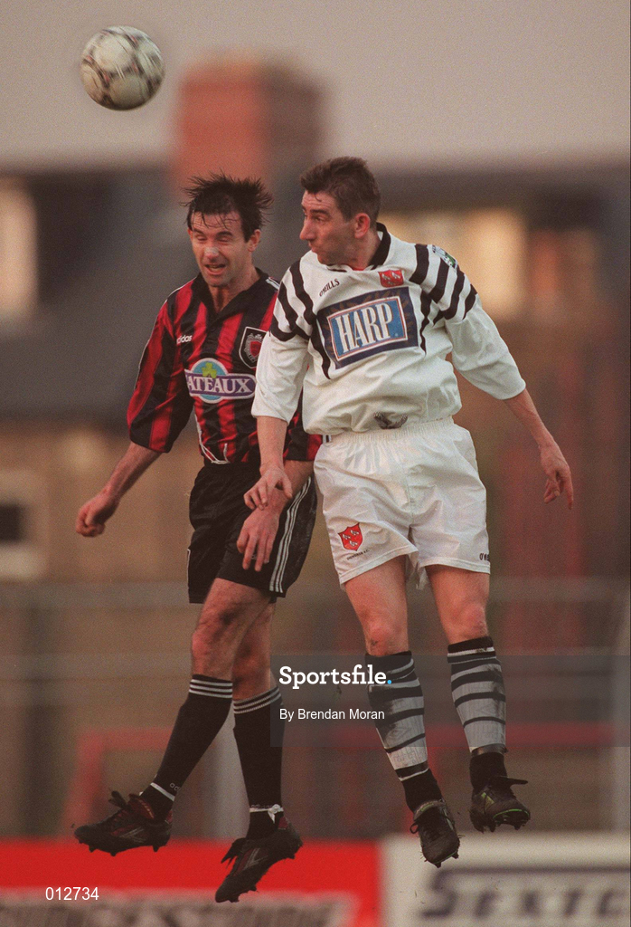 14 December 1997; Brian Mullen of Bohemians in action against Paul Carlyle of Dundalk during the Harp Lager National League Premier Division match between Bohemians and Dundalk at Dalymount Park in Dublin. Photo by Brendan Moran/Sportsfile