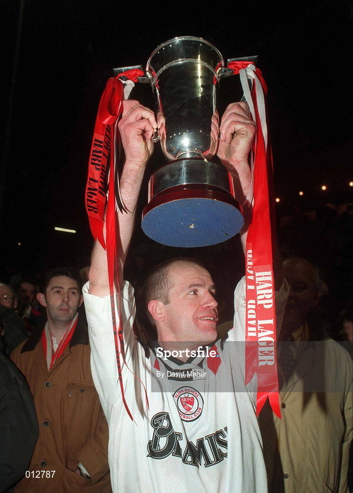 24 February 1998; Sligo Rovers player/manager Nicky Reid lifts the trophy following the Harp Lager League Cup Final 2nd Leg match between Shelbourne and Sligo Rovers at Tolka Park in Dublin. Photo by David Maher/Sportsfile