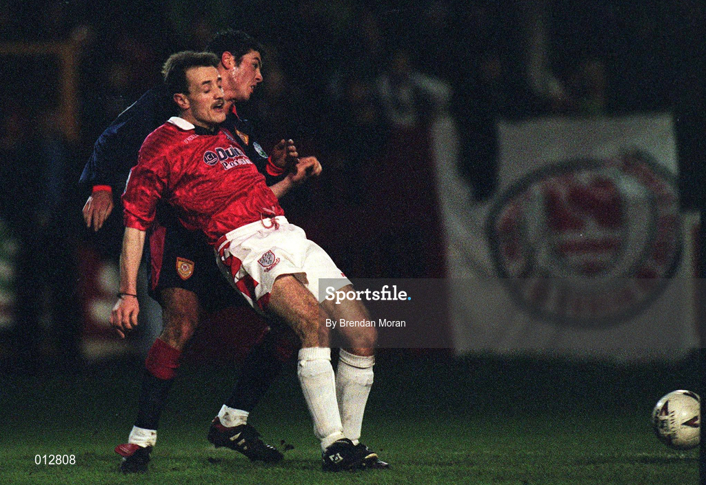12 December 1997; Keith Long of St. Patrick's Athletic in action against Stephen Geoghegan of Shelbourne during the Harp Lager National League Premier Division match between Shelbourne and St Patrick's Athletic at Tolka Park in Dublin. Photo by Brendan Moran/Sportsfile