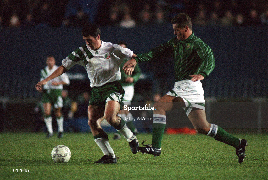 17 November 1993; Roy Keane of Republic of Ireland in action against Jim Magilton of Northern Ireland during the FIFA World Cup Qualifier match between Northern Ireland and Republic of Ireland at Windsor Park in Belfast. Photo by Ray McManus/Sportsfile