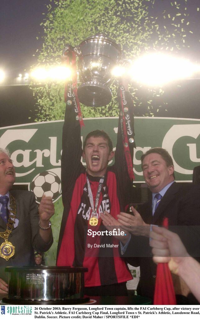 26 October 2003; Barry Ferguson, Longford Town captain, lifts the FAI Carlsberg Cup, after victory over St. Patrick's Athletic. FAI Carlsberg Cup Final, Longford Town v St. Patrick's Athletic, Lansdowne Road, Dublin. Soccer. Picture credit; David Maher / SPORTSFILE *EDI*