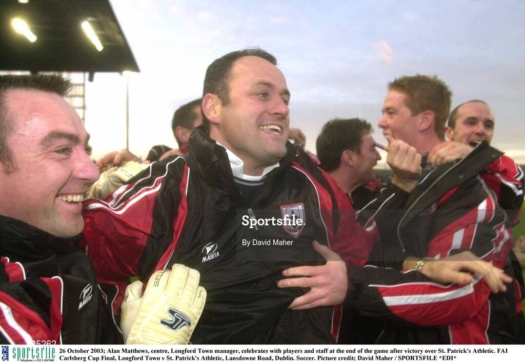 26 October 2003; Alan Mathews, centre, Longford Town manager, celebrates with players and staff at the end of the game after victory over St. Patrick's Athletic. FAI Carlsberg Cup Final, Longford Town v St. Patrick's Athletic, Lansdowne Road, Dublin. Soccer. Picture credit; David Maher / SPORTSFILE *EDI*