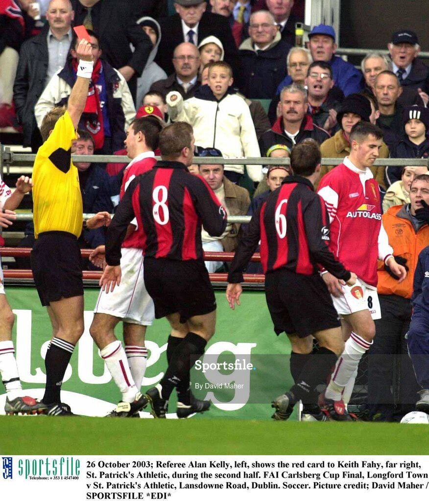 26 October 2003; Referee Alan Kelly, left, shows the red card to Keith Fahy, far right, St. Patrick's Athletic, during the second half. FAI Carlsberg Cup Final, Longford Town v St. Patrick's Athletic, Lansdowne Road, Dublin. Soccer. Picture credit; David Maher / SPORTSFILE *EDI*