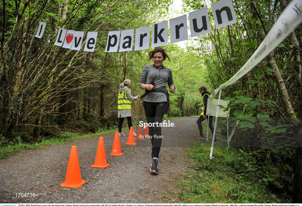 18 May 2019; Participant crosses the line during the Clonbur Woods parkrun in partnership with Vhi at Clonbur Woods, Clonbur, Co. Galway. Parkrun Ireland in partnership with Vhi, added a new parkrun at Clonbur Woods on Saturday, 18th May, with the introduction of the Clonbur Woods parkrun in Clonbur, Co. Galway. Parkruns take place over a 5km course weekly, are free to enter and are open to all ages and abilities, providing a fun and safe environment to enjoy exercise. To register for a parkrun near you visit www.parkrun.ie. Photo by Ray Ryan/Sportsfile