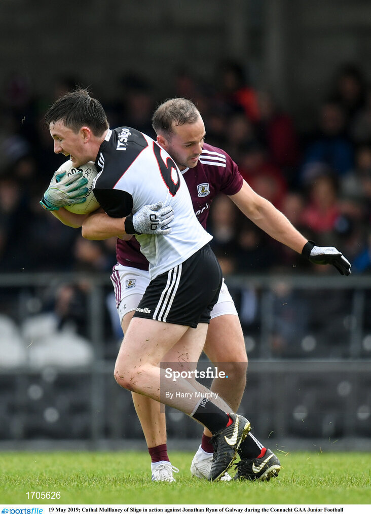 19 May 2019; Cathal Mulllaney of Sligo in action against Jonathan Ryan of Galway during the Connacht GAA Junior Football Championship match between Sligo and Galway at Markievicz Park in Sligo. Photo by Harry Murphy/Sportsfile