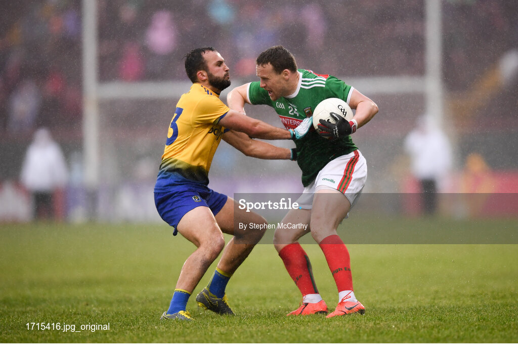 25 May 2019; Andy Moran of Mayo in action against Ultan Harney of Roscommon during the Connacht GAA Football Senior Championship Semi-Final match between Mayo and Roscommon at Elverys MacHale Park in Castlebar, Mayo. Photo by Stephen McCarthy/Sportsfile