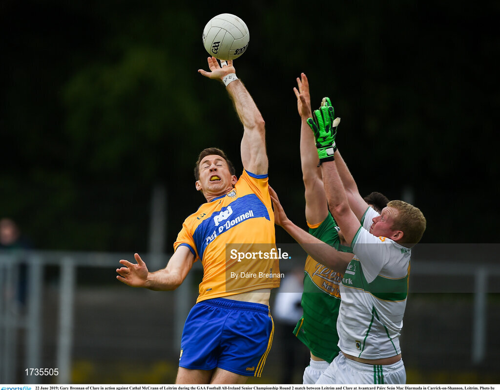 22 June 2019; Gary Brennan of Clare in action against Cathal McCrann of Leitrim during the GAA Football All-Ireland Senior Championship Round 2 match between Leitrim and Clare at Avantcard Páirc Seán Mac Diarmada in Carrick-on-Shannon, Leitrim. Photo by Daire Brennan/Sportsfile