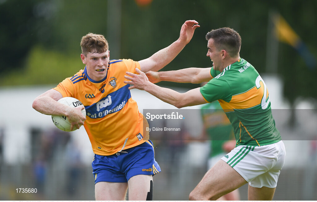 22 June 2019; Seán O’Donoghue of Clare in action against Paddy Maguire of Leitrim during the GAA Football All-Ireland Senior Championship Round 2 match between Leitrim and Clare at Avantcard Páirc Seán Mac Diarmada in Carrick-on-Shannon, Leitrim. Photo by Daire Brennan/Sportsfile