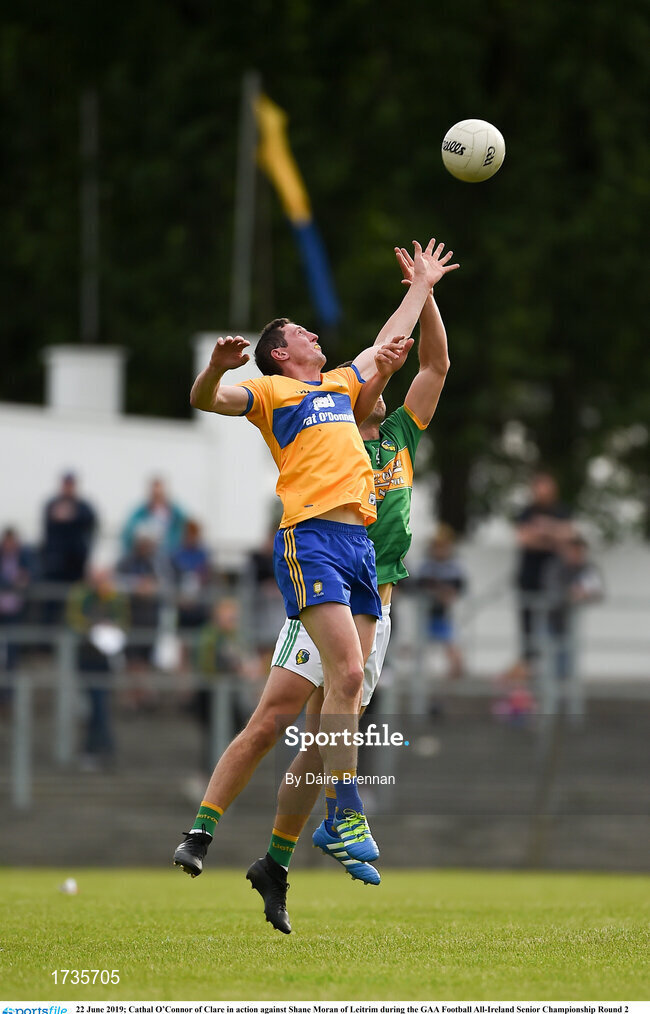 22 June 2019; Cathal O’Connor of Clare in action against Shane Moran of Leitrim during the GAA Football All-Ireland Senior Championship Round 2 match between Leitrim and Clare at Avantcard Páirc Seán Mac Diarmada in Carrick-on-Shannon, Leitrim. Photo by Daire Brennan/Sportsfile
