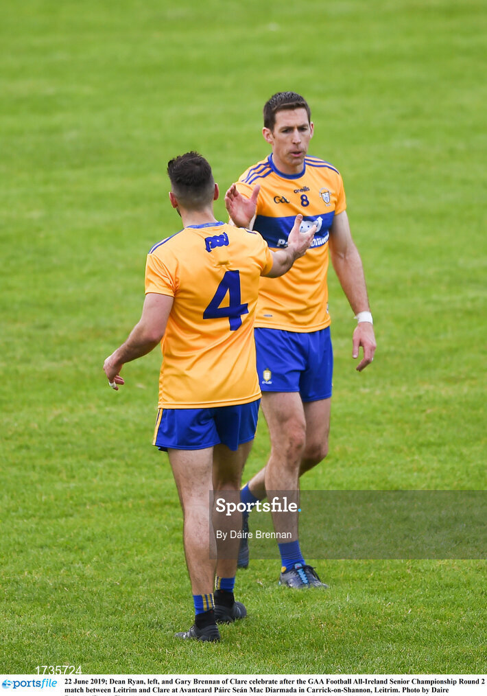 22 June 2019; Dean Ryan, left, and Gary Brennan of Clare celebrate after the GAA Football All-Ireland Senior Championship Round 2 match between Leitrim and Clare at Avantcard Páirc Seán Mac Diarmada in Carrick-on-Shannon, Leitrim. Photo by Daire Brennan/Sportsfile