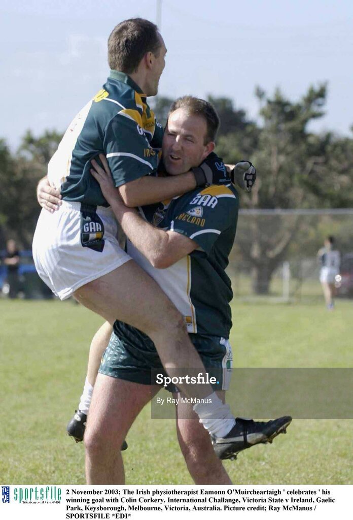 2 November 2003; The Irish physiotherapist Eamonn O'Muircheartaigh ' celebrates ' his winning goal with Colin Corkery. International Challange, Victoria State v Ireland, Gaelic Park, Keysborough, Melbourne, Victoria, Australia. Picture credit; Ray McManus / SPORTSFILE *EDI*