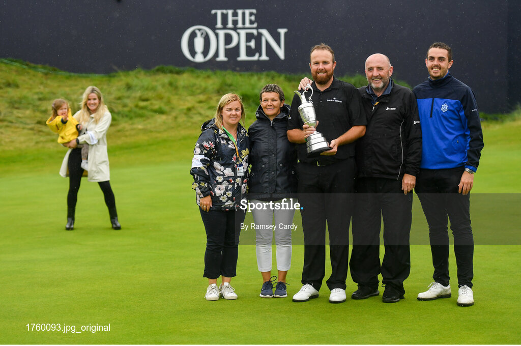 21 July 2019; Shane Lowry of Ireland celebrates with his parents Bridget and Brendan Lowry, brother Alan and sister Sinead with the Claret Jug, with his wife Wendy Horner and daughter Iris, left, after winning The Open Championship on Day Four of the 148th Open Championship at Royal Portrush in Portrush, Co Antrim. Photo by Ramsey Cardy/Sportsfile