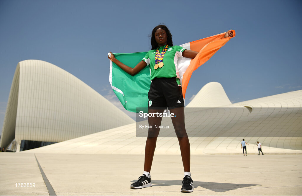 27 July 2019; Ireland's Rhasidat Adeleke poses for a portrait with her 100m & 200m gold medals in front of the Heydar Aliyev Center in Baku during Day Six of the 2019 Summer European Youth Olympic Festival in Baku, Azerbaijan. Photo by Eóin Noonan/Sportsfile