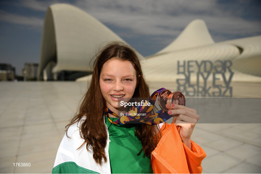 27 July 2019; Molly Mayne of Ireland poses for a portrait with her 100m breaststroke and 200m breaststroke bronze medals in front of the Heydar Aliyev Center in Baku during Day Six of the 2019 Summer European Youth Olympic Festival in Baku, Azerbaijan. Photo by Eóin Noonan/Sportsfile