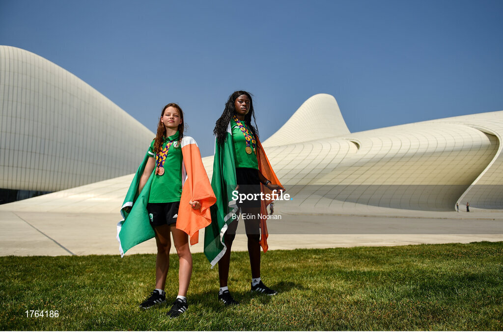 27 July 2019; Molly Mayne, left, and Rhasidat Adeleke of Ireland pose for a portrait with their 100m and 200m breaststroke Bronze medals, and 100m, 200m Gold medals in front of the Heydar Aliyev Center in Baku during Day Six of the 2019 Summer European Youth Olympic Festival in Baku, Azerbaijan. Photo by Eóin Noonan/Sportsfile
