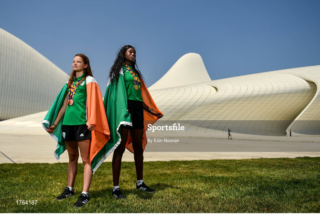 27 July 2019; Molly Mayne, left, and Rhasidat Adeleke of Ireland pose for a portrait with their 100m and 200m breaststroke Bronze medals, and 100m, 200m Gold medals in front of the Heydar Aliyev Center in Baku during Day Six of the 2019 Summer European Youth Olympic Festival in Baku, Azerbaijan. Photo by Eóin Noonan/Sportsfile