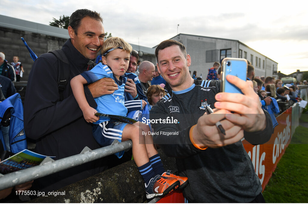 12 August 2019; Philip McMahon of Dublin takes a selfie with supporters Kevin Birrane and his son ?Caoimhín, age 4, from Mount Merrion, Co Dublin during a meet and greet at Parnell Park in Dublin. Photo by David Fitzgerald/Sportsfile