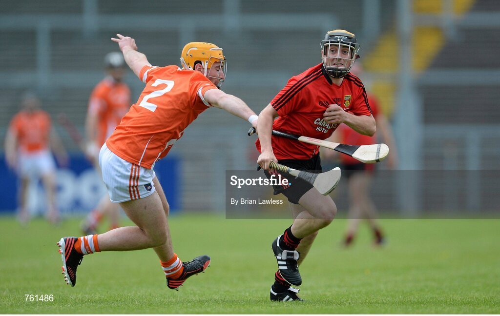 16 June 2013; Scott Nicholson, Down, in action against Connor Devlin, Armagh. Ulster GAA Hurling Senior Championship Quarter-Final, Down v Armagh, Páirc Esler, Newry, Co. Down. Picture credit: Brian Lawless / SPORTSFILE