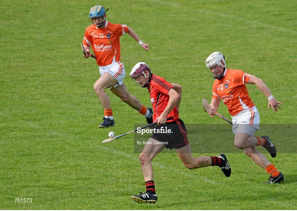 16 June 2013; Donal Hughes, Down, in action against Nathan Curry, right, and Ruairi Fullerton, Armagh. Ulster GAA Hurling Senior Championship Quarter-Final, Down v Armagh, Páirc Esler, Newry, Co. Down. Picture credit: Brian Lawless / SPORTSFILE