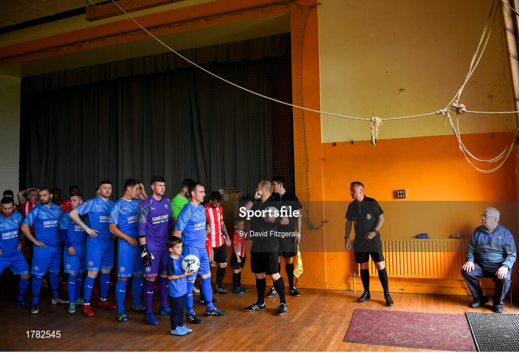 25 August 2019; Players from both sides prepare to take to the field prior to the Extra.ie FAI Cup Second Round match between Crumlin United and Lucan United at CBS Captain's Road in Crumlin, Dublin. Photo by David Fitzgerald/Sportsfile
