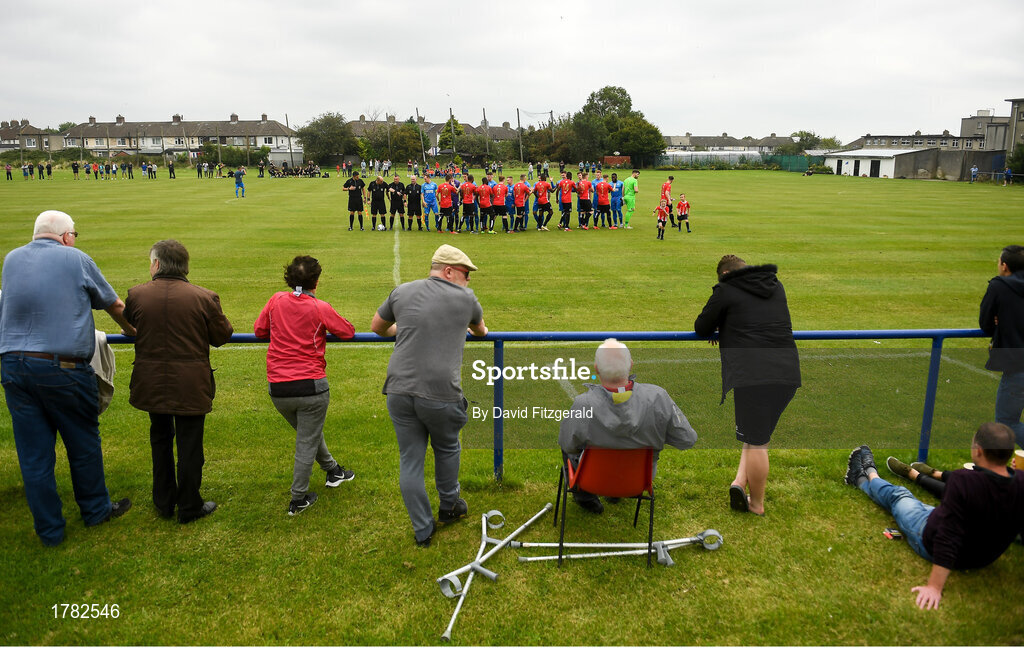 25 August 2019; Players from both sides shake hands prior to the Extra.ie FAI Cup Second Round match between Crumlin United and Lucan United at CBS Captain's Road in Crumlin, Dublin. Photo by David Fitzgerald/Sportsfile