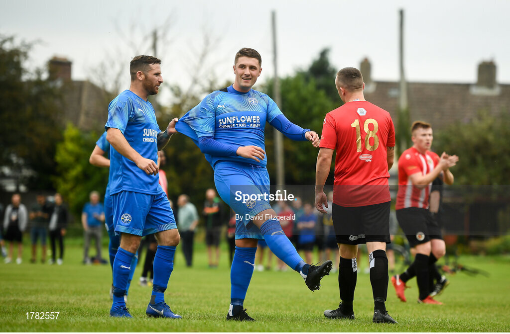 25 August 2019; Jake Donnelly of Crumlin United, centre, is congratulated by team-mate Dean Kelly after scoring his side's second goal of the game the Extra.ie FAI Cup Second Round match between Crumlin United and Lucan United at CBS Captain's Road in Crumlin, Dublin. Photo by David Fitzgerald/Sportsfile