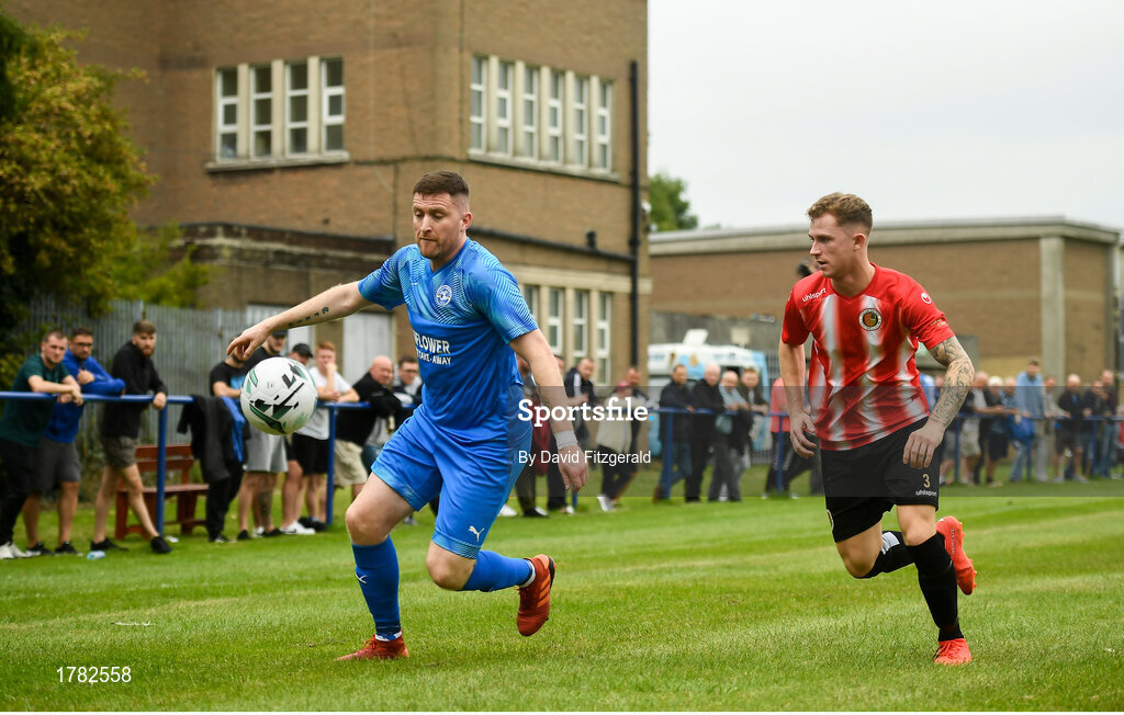 25 August 2019; Craig Walsh of Crumlin United in action against Shane Maloney of Lucan United during the Extra.ie FAI Cup Second Round match between Crumlin United and Lucan United at CBS Captain's Road in Crumlin, Dublin. Photo by David Fitzgerald/Sportsfile