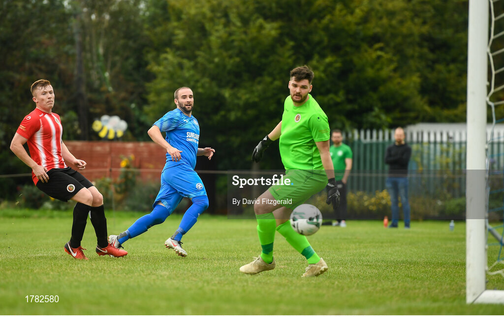 25 August 2019; Alan McGreal of Crumlin United scores his side's third goal of the game during the Extra.ie FAI Cup Second Round match between Crumlin United and Lucan United at CBS Captain's Road in Crumlin, Dublin. Photo by David Fitzgerald/Sportsfile