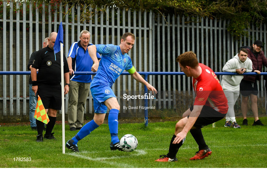 25 August 2019; Thomas Hyland of Crumlin United in action against Andrew Bracken of Lucan United during the Extra.ie FAI Cup Second Round match between Crumlin United and Lucan United at CBS Captain's Road in Crumlin, Dublin. Photo by David Fitzgerald/Sportsfile