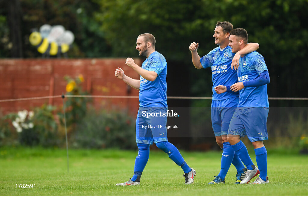 25 August 2019; Alan McGreal of Crumlin United, left, celebrates after scoring his side's third goal of the game with team-mates during the Extra.ie FAI Cup Second Round match between Crumlin United and Lucan United at CBS Captain's Road in Crumlin, Dublin. Photo by David Fitzgerald/Sportsfile