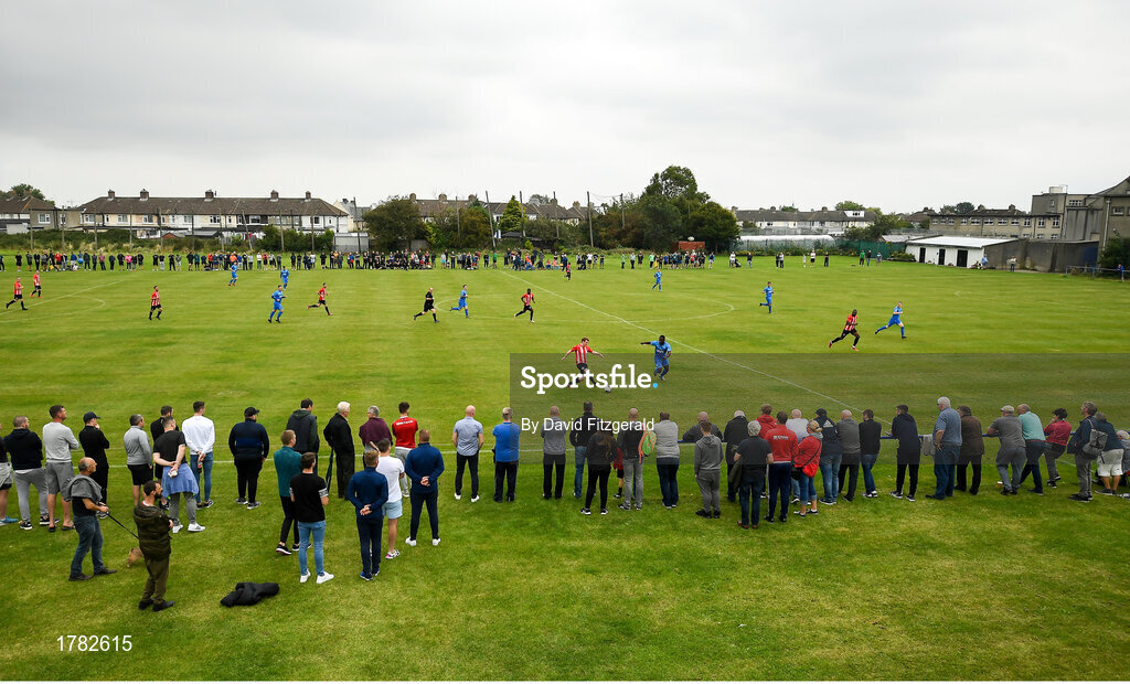 25 August 2019; Andrew Bracken of Lucan United in action against Blair Mandiangu of Crumlin United during the Extra.ie FAI Cup Second Round match between Crumlin United and Lucan United at CBS Captain's Road in Crumlin, Dublin. Photo by David Fitzgerald/Sportsfile