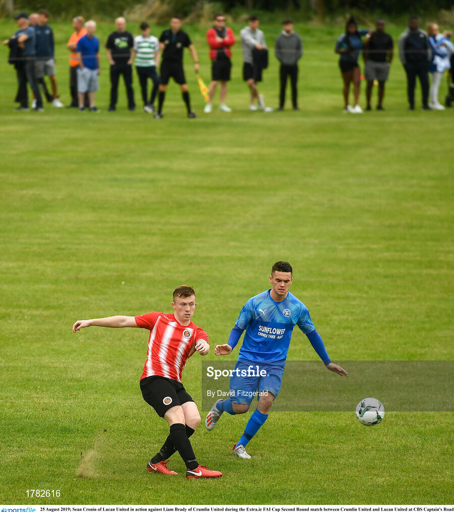 25 August 2019; Sean Cronin of Lucan United in action against Liam Brady of Crumlin United during the Extra.ie FAI Cup Second Round match between Crumlin United and Lucan United at CBS Captain's Road in Crumlin, Dublin. Photo by David Fitzgerald/Sportsfile