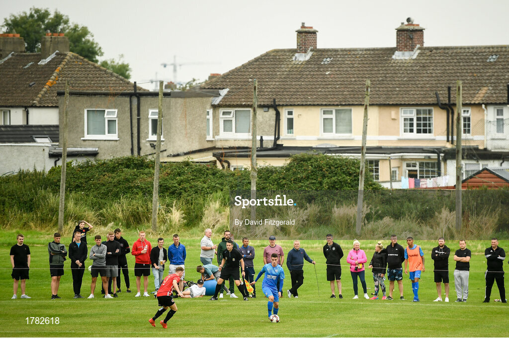25 August 2019; Liam Brady of Crumlin United in action against Shane Maloney of Lucan United during the Extra.ie FAI Cup Second Round match between Crumlin United and Lucan United at CBS Captain's Road in Crumlin, Dublin. Photo by David Fitzgerald/Sportsfile