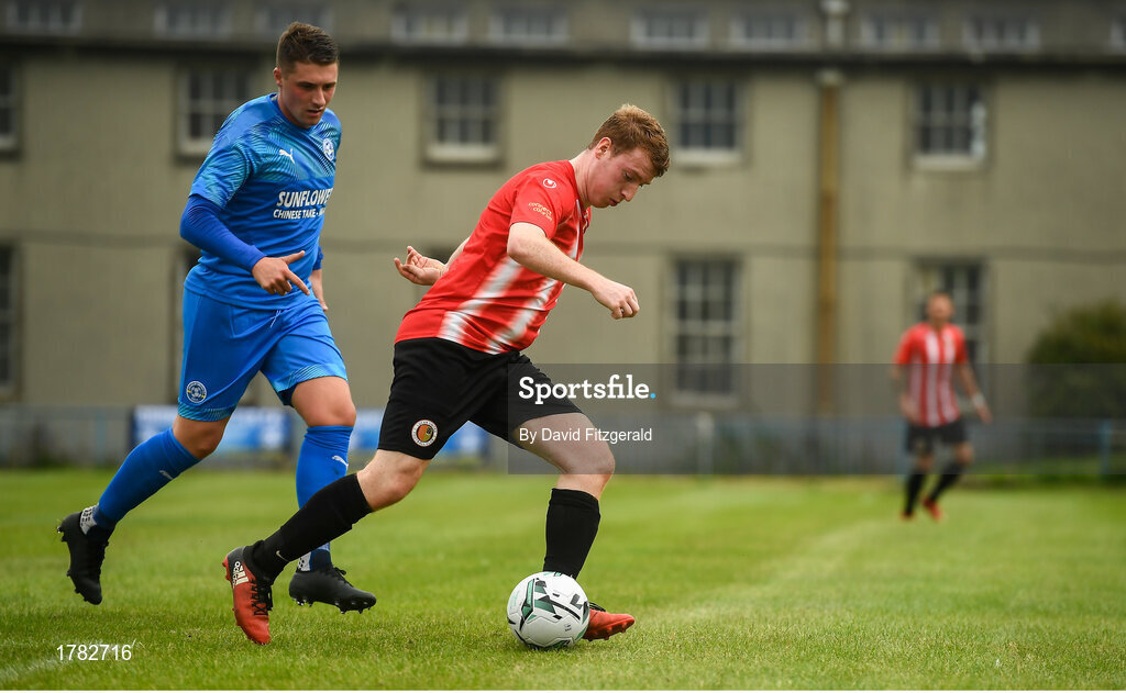 25 August 2019; Andrew Bracken of Lucan United in action against Jake Donnelly of Crumlin United during the Extra.ie FAI Cup Second Round match between Crumlin United and Lucan United at CBS Captain's Road in Crumlin, Dublin. Photo by David Fitzgerald/Sportsfile