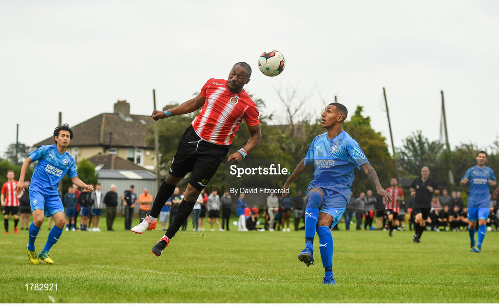 25 August 2019; Boby Mazono of Lucan United in action against Sam Burgess of Crumlin United during the Extra.ie FAI Cup Second Round match between Crumlin United and Lucan United at CBS Captain's Road in Crumlin, Dublin. Photo by David Fitzgerald/Sportsfile