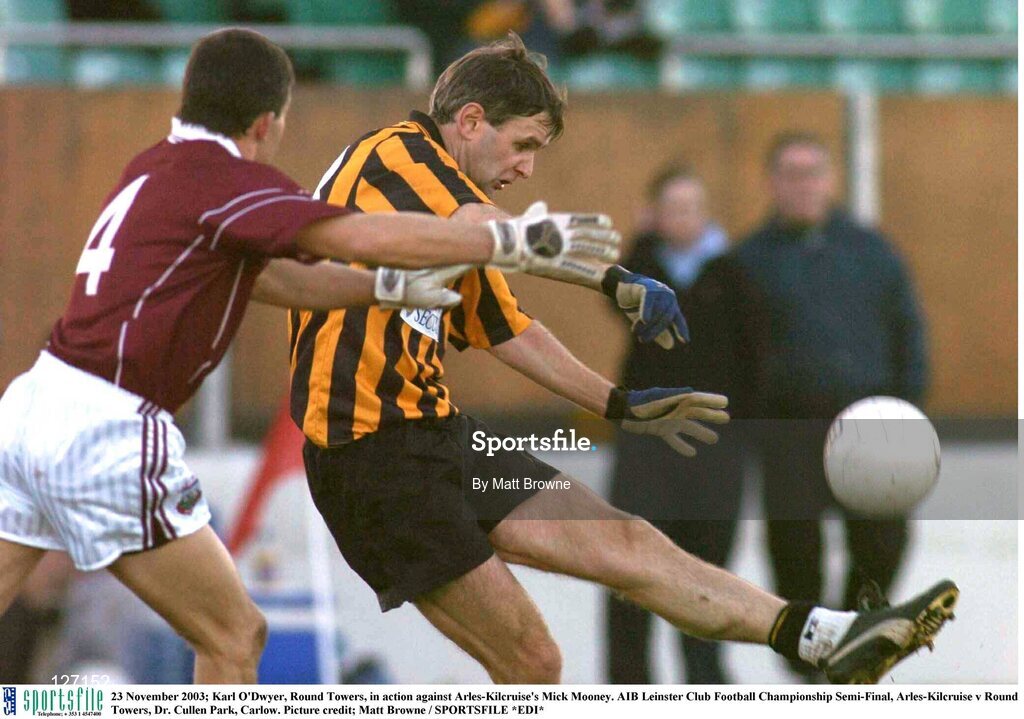 23 November 2003; Karl O'Dwyer, Round Towers, in action against Arles-Kilcruise's Mick Mooney. AIB Leinster Club Football Championship Semi-Final, Arles-Kilcruise v Round Towers, Dr. Cullen Park, Carlow. Picture credit; Matt Browne / SPORTSFILE *EDI*