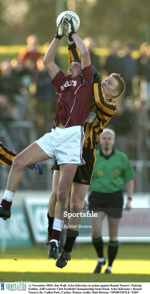 23 November 2003; Jim Wall, Arles-Kilcruise, in action against Round Towers', Padraig Golden. AIB Leinster Club Football Championship Semi-Final, Arles-Kilcruise v Round Towers, Dr. Cullen Park, Carlow. Picture credit; Matt Browne / SPORTSFILE *EDI*
