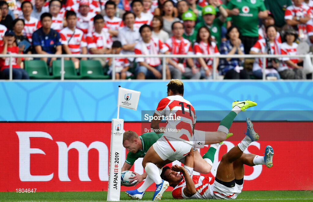 28 September 2019; Keith Earls of Ireland is tackled into touch by Shota Horie and Lomano Lemeki, 11, of Japan during the 2019 Rugby World Cup Pool A match between Japan and Ireland at the Shizuoka Stadium Ecopa in Fukuroi, Shizuoka Prefecture, Japan. Photo by Brendan Moran/Sportsfile
