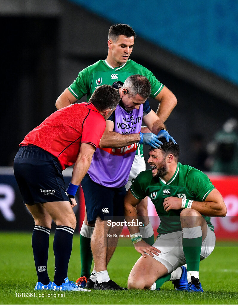 19 October 2019; Garry Ringrose of Ireland get medical attention from Ireland team doctor Dr Ciaran Cosgrove during the 2019 Rugby World Cup Quarter-Final match between New Zealand and Ireland at the Tokyo Stadium in Chofu, Japan. Photo by Brendan Moran/Sportsfile