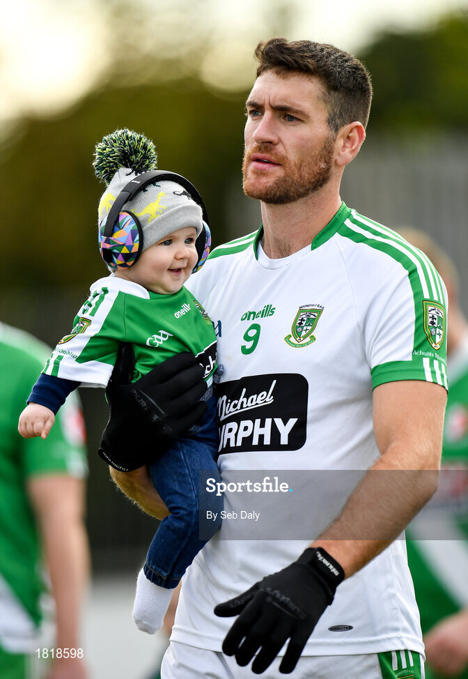 20 October 2019; David Whyte of Moorefield with son Frankie, age 6 months, during the parade prior to the Kildare County Senior Club Football Championship Final match between Moorefield and Sarsfields at St Conleth's Park in Newbridge, Kildare. Photo by Seb Daly/Sportsfile