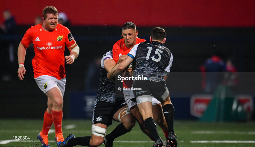 25 October 2019; Dan Goggin of Munster is tackled by Cai Evans, right, and Olly Cracknell of Ospreys during the Guinness PRO14 Round 4 match between Munster and Ospreys at Irish Independent Park in Cork. Photo by Sam Barnes/Sportsfile