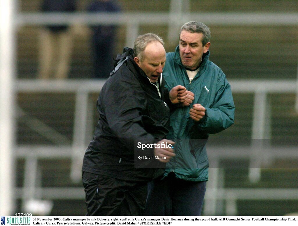 30 November 2003; Caltra manager Frank Doherty, right, confronts Curry's manager Denis Kearney during the second half. AIB Connacht Senior Football Championship Final, Caltra v Curry, Pearse Stadium, Galway. Picture credit; David Maher / SPORTSFILE *EDI*