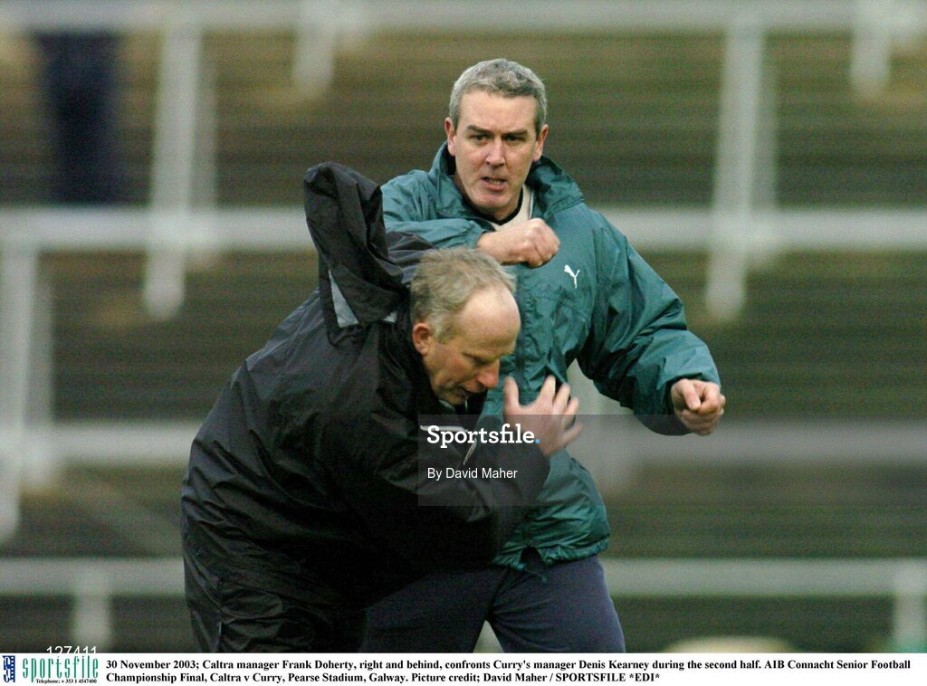 30 November 2003; Caltra manager Frank Doherty, right and behind, confronts Curry's manager Denis Kearney during the second half. AIB Connacht Senior Football Championship Final, Caltra v Curry, Pearse Stadium, Galway. Picture credit; David Maher / SPORTSFILE *EDI*